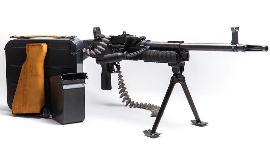 A MarColMar UKM semi-auto belt-fed rifle with accessories