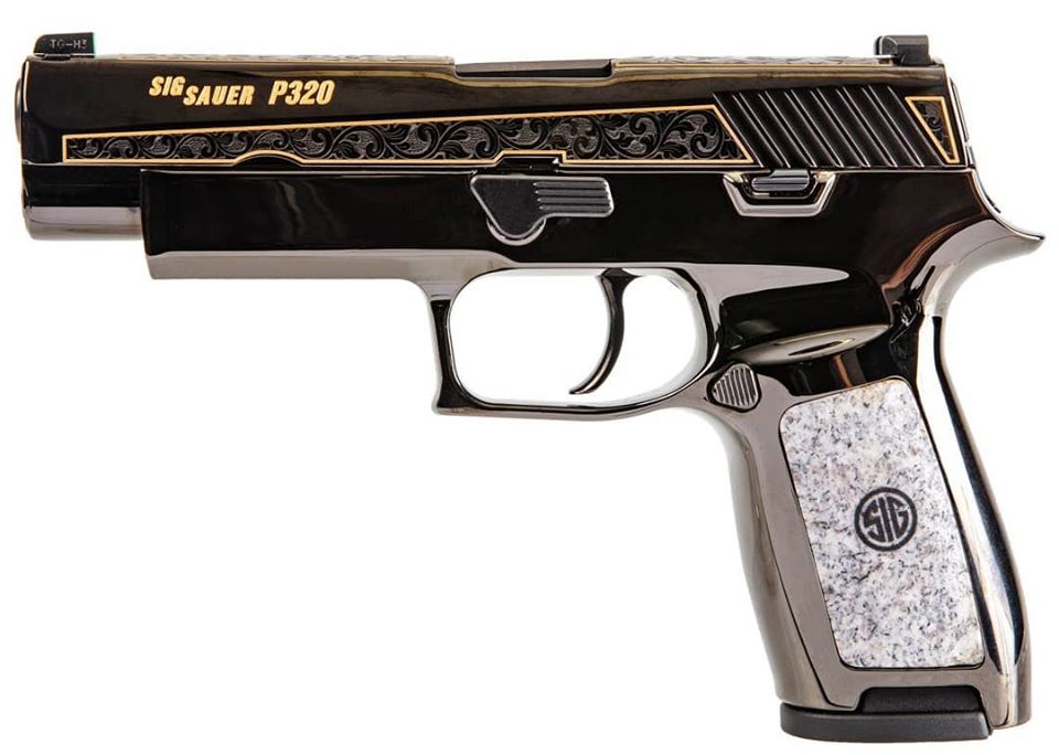 A close up lightbox shot of an engraved Sig Sauer P320 pistol