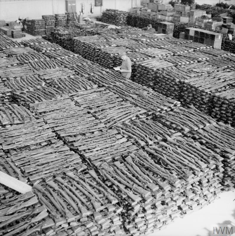 NORWAY AFTER LIBERATION 1945 (BU 9763) Storeroom at Solar aerodrome, Stavanger, holding some of the estimated 30,000 rifles taken from German forces in Norway after their surrender. Copyright: © IWM. Original Source: http://www.iwm.org.uk/collections/item/object/205205892