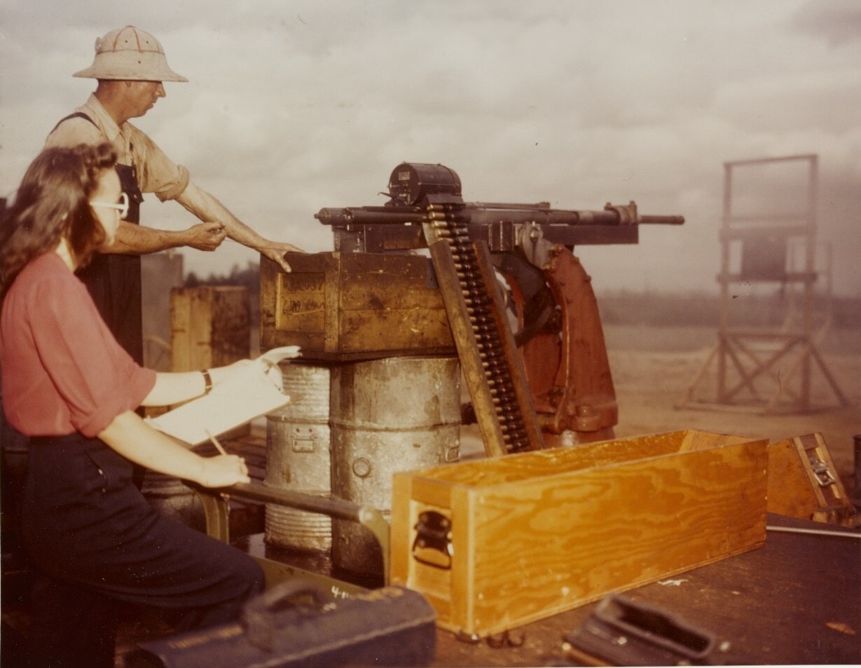 80-G-K-13606 Dahlgren Workers test fire a 20mm aircraft machine cannon