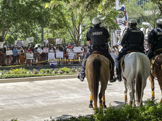 Houston NRA – Light Crowds on Both Sides of the Street