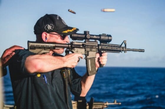 TOP MEN? US Navy Deletes Tweet of USS McCain Captain Shooting Backwards Scoped AR